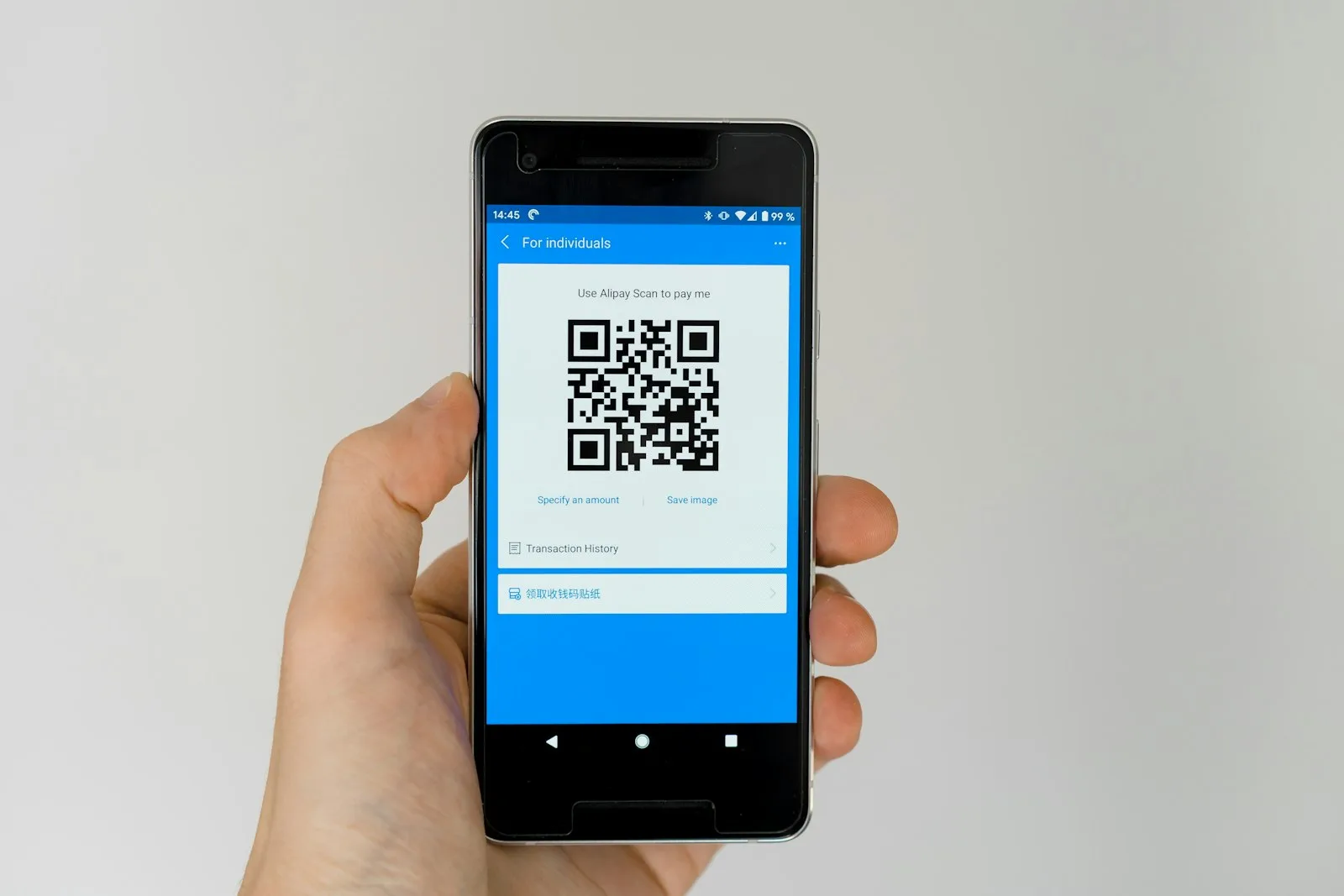 Smartphone screen displaying a QR code for a mobile payment