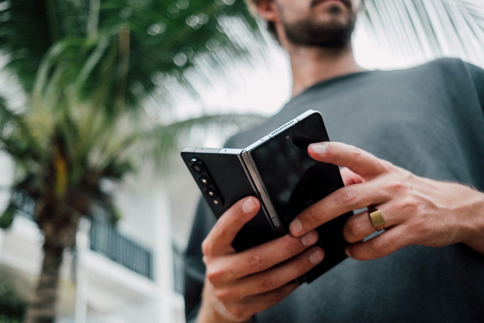 Man holding a smartphone in both hands